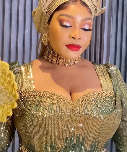 Pink Sequin Embellished Peplum Mermaid Gown