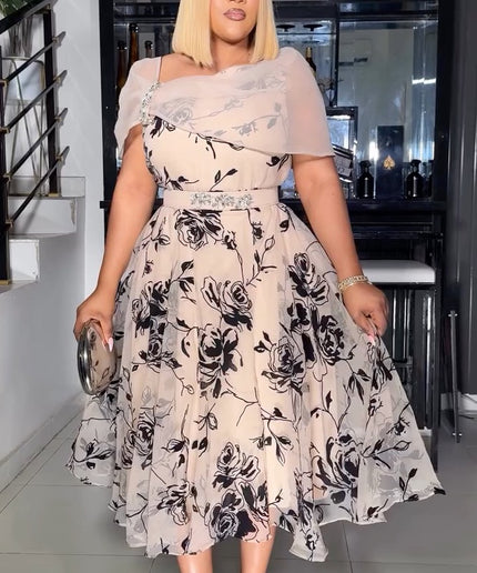 Woman wearing a floral dress in an indoor setting