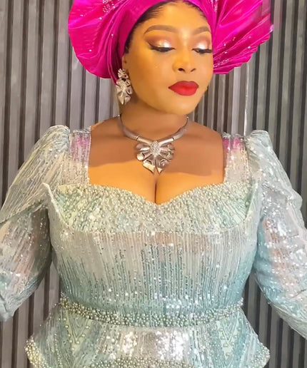 Pink Sequin Embellished Peplum Mermaid Gown