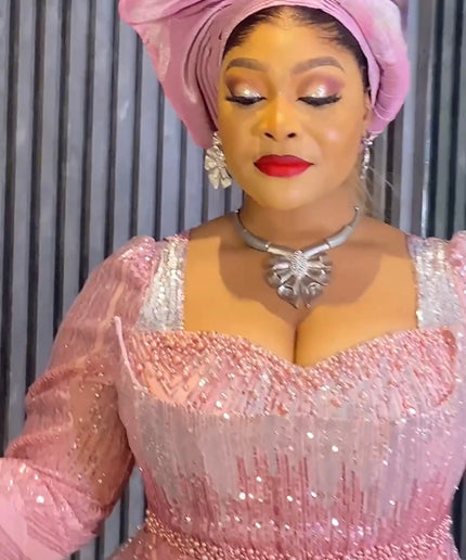 Pink Sequin Embellished Peplum Mermaid Gown