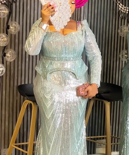 Pink Sequin Embellished Peplum Mermaid Gown